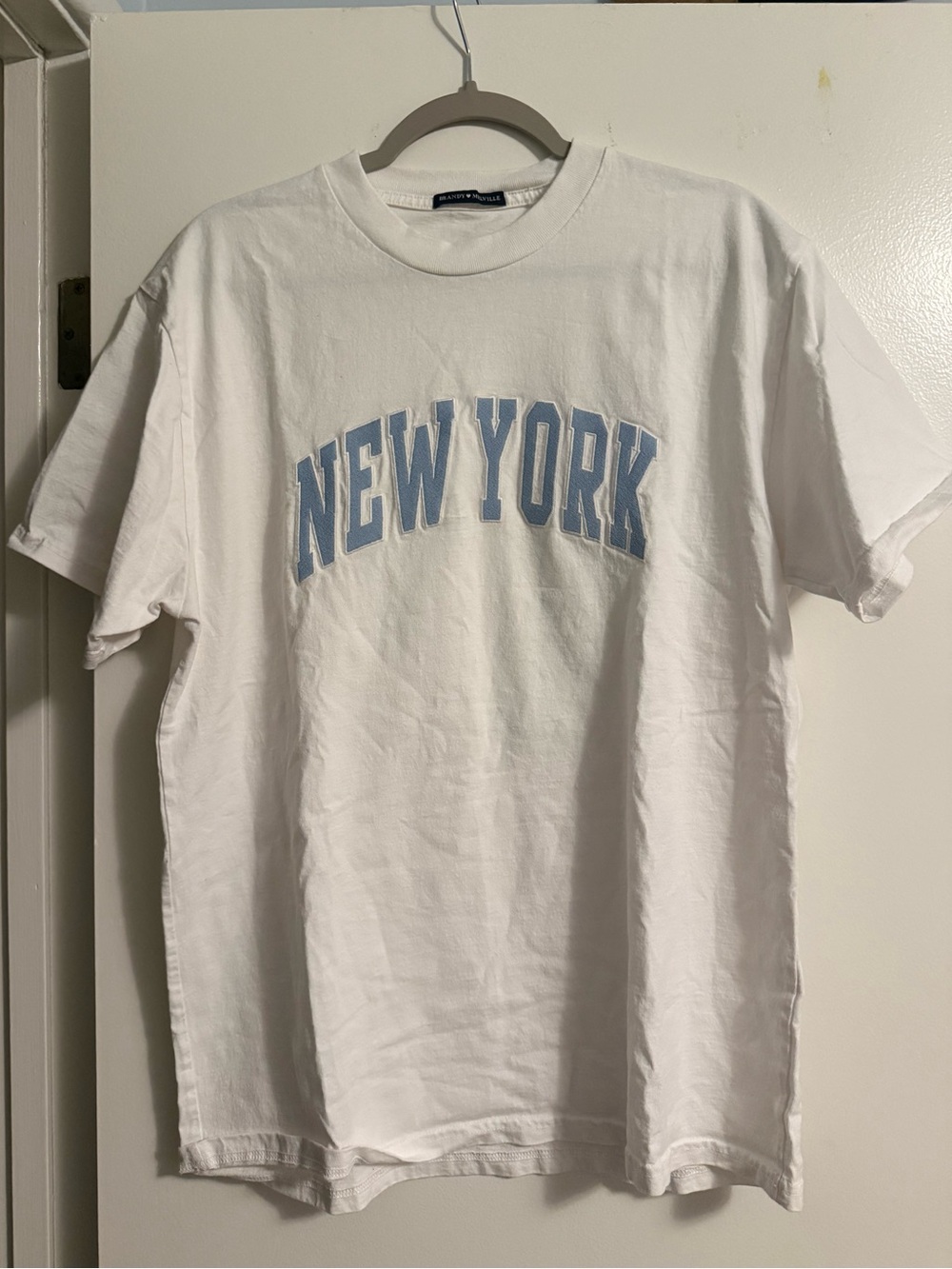 White Brandy Melville Tee, "New York" university-style patch letters